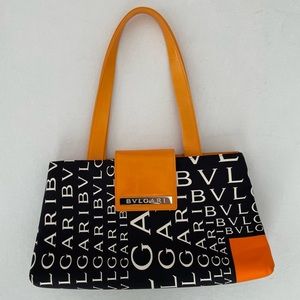 BVLGARI black and orange neoprene shoulder bag. Leather handles.